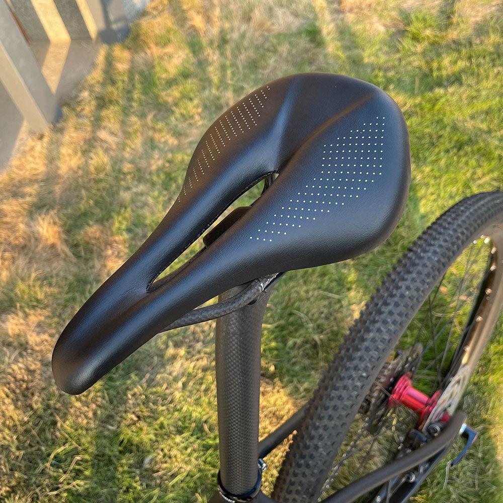 Full Carbon Saddle Road Bike Super Light Leather Carbon Bicycle Seat Optimized For Men Flexible And Comfortable Sit Bone Support Shock Absorbing Road Bike Saddle